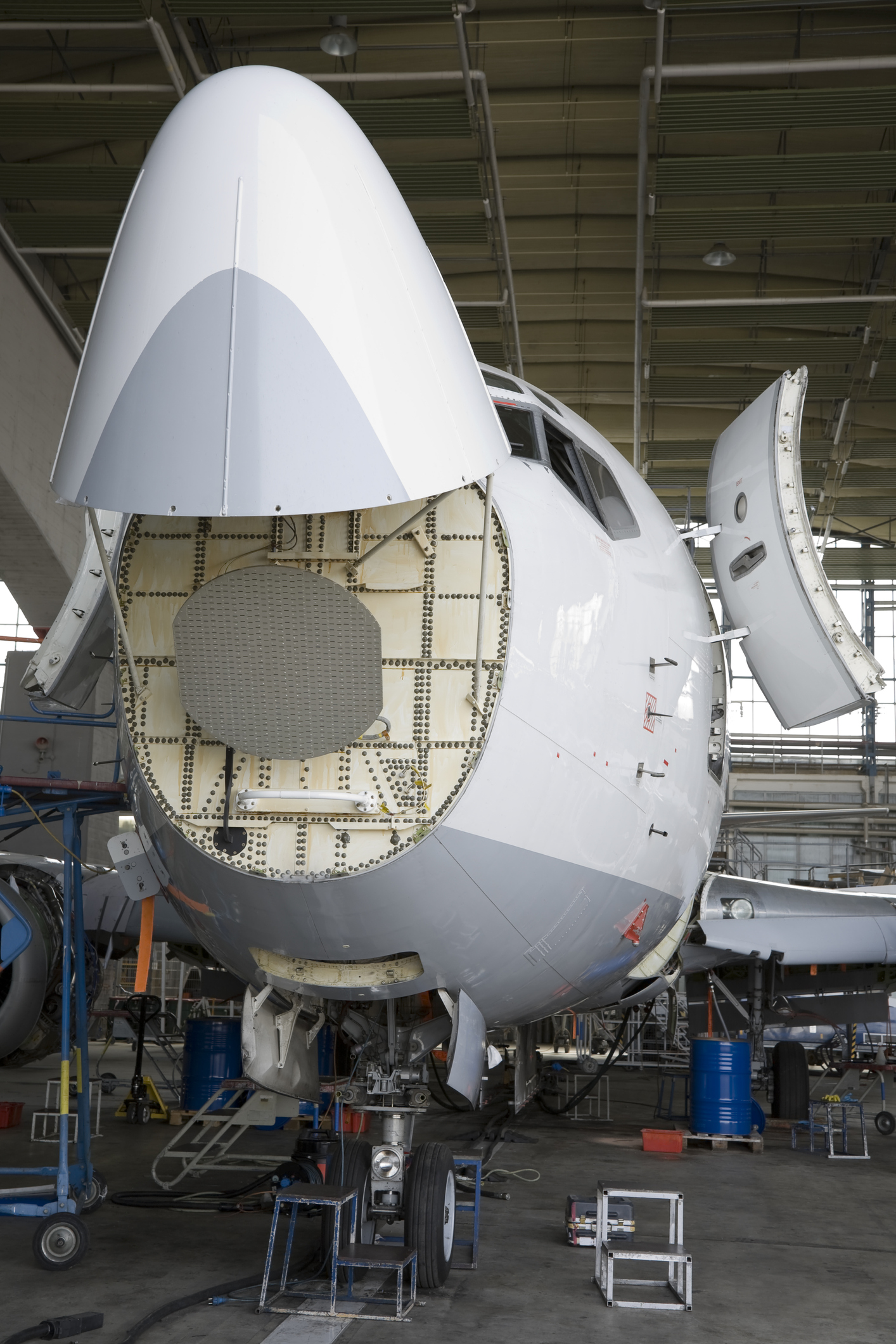 Commercial Airplane Maintenance Check in Hangar